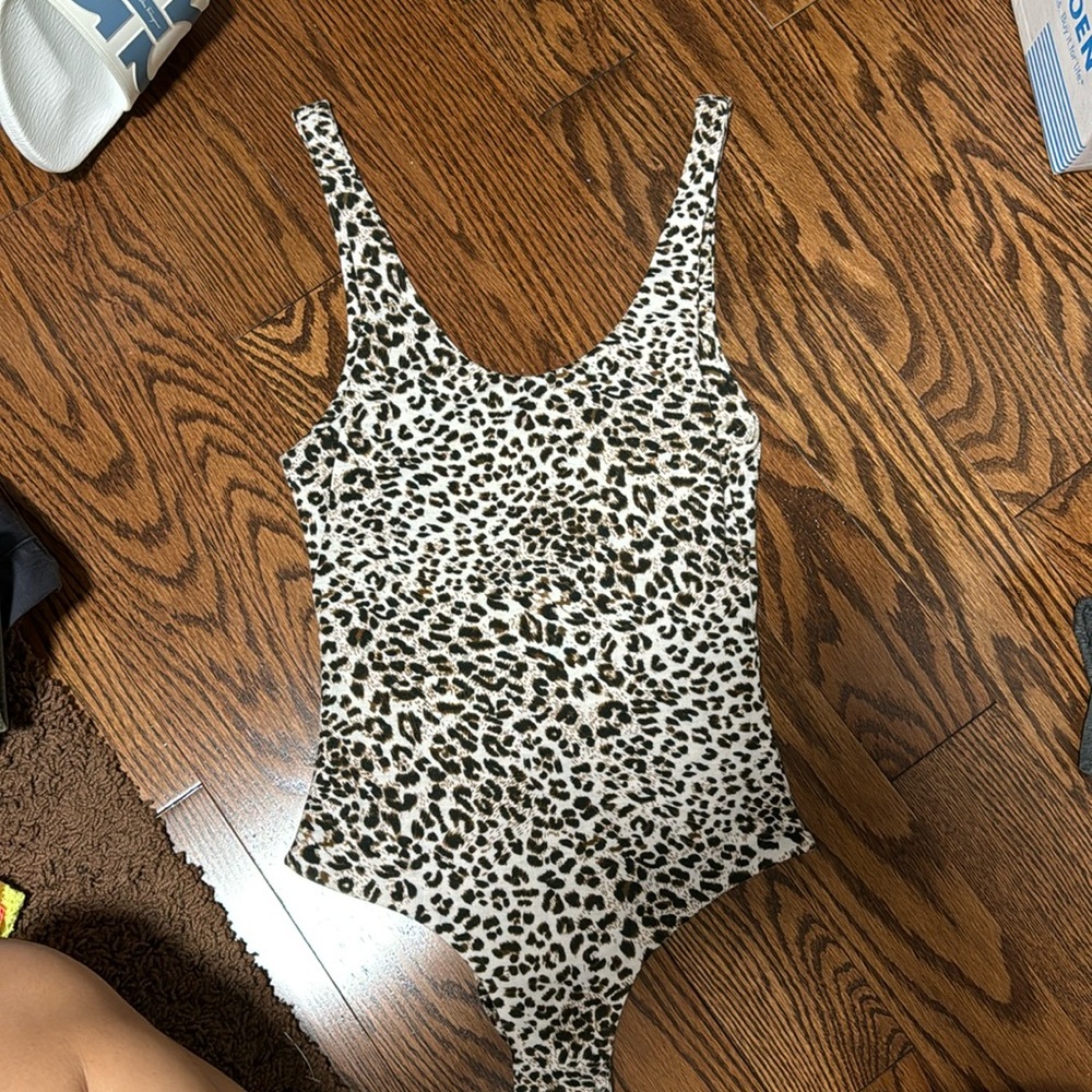Kittenish cheetah body suit. Size: XS.